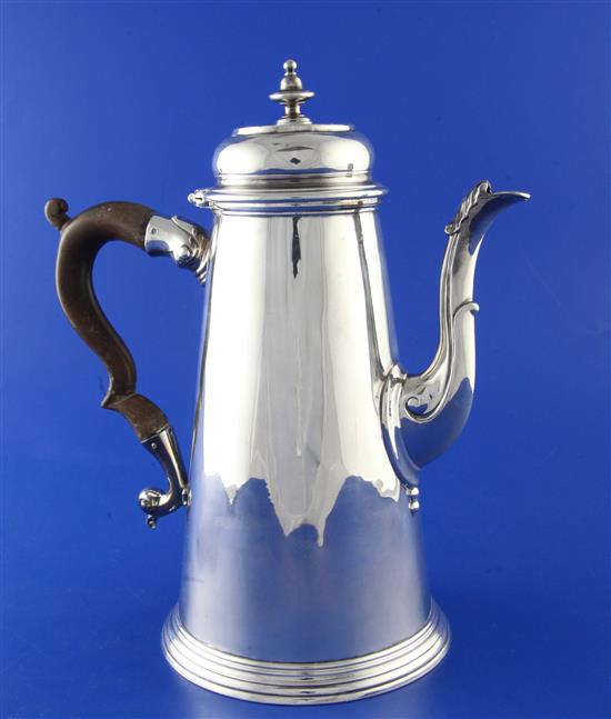 A George II silver coffee pot, gross 28 oz.